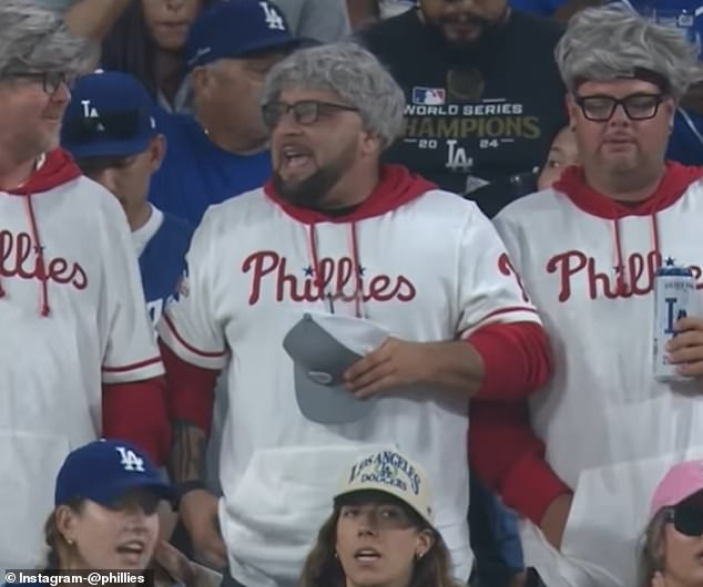 102221511-0-Three_Phillies_fans_dressed_up_as_Phillies_Karen_on_Tuesday_nigh-a-57_1758123771052.jpg