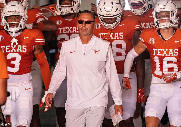 103309747-15228647-Texas_Longhorns_head_coach_Steve_Sarkisian_is_reportedly_interes-a-2_176149213359.jpeg