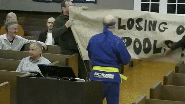 nj-candidate-kung-fu-kick-protest.gif